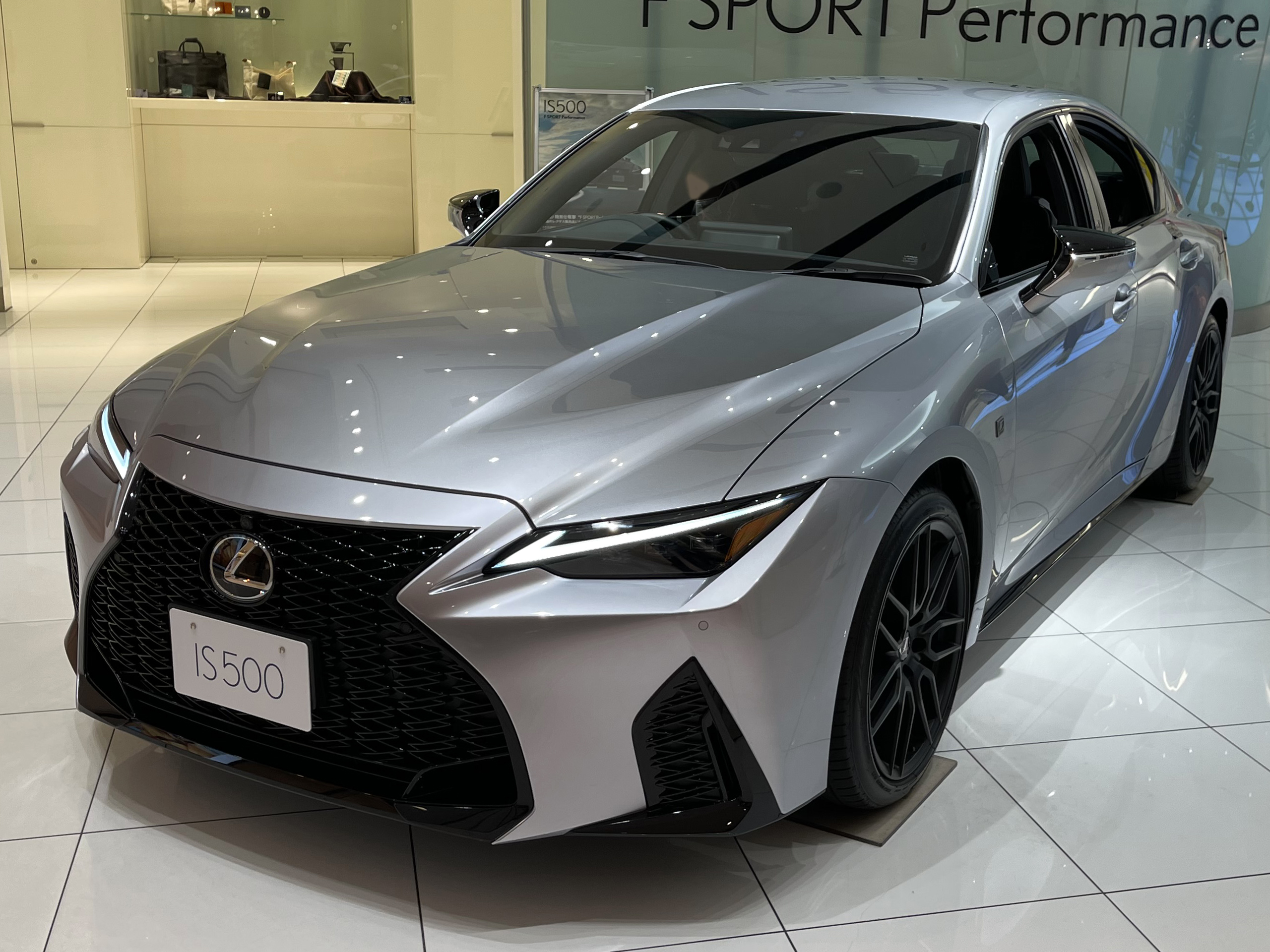 Silver Lexus IS 500 F SPORT Performance in a showroom